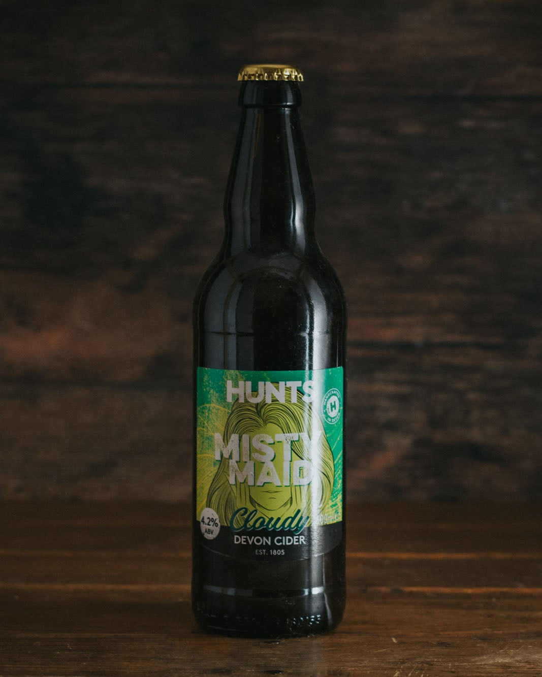 A bottle of Hunts Misty Maid Cloudy Devon Cider.