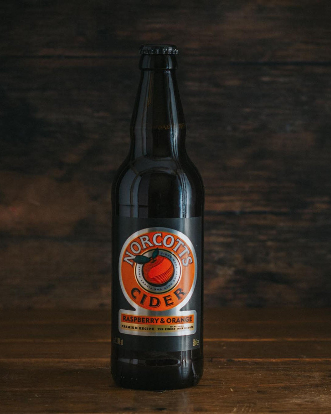 A 500ml bottle of Norcotts Raspberry And Orange Cider.