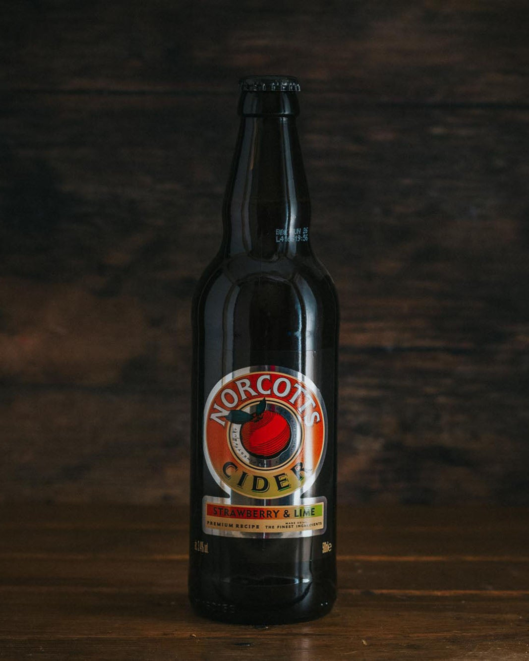 A 500ml bottle of Norcotts Strawberry And Lime Cider.