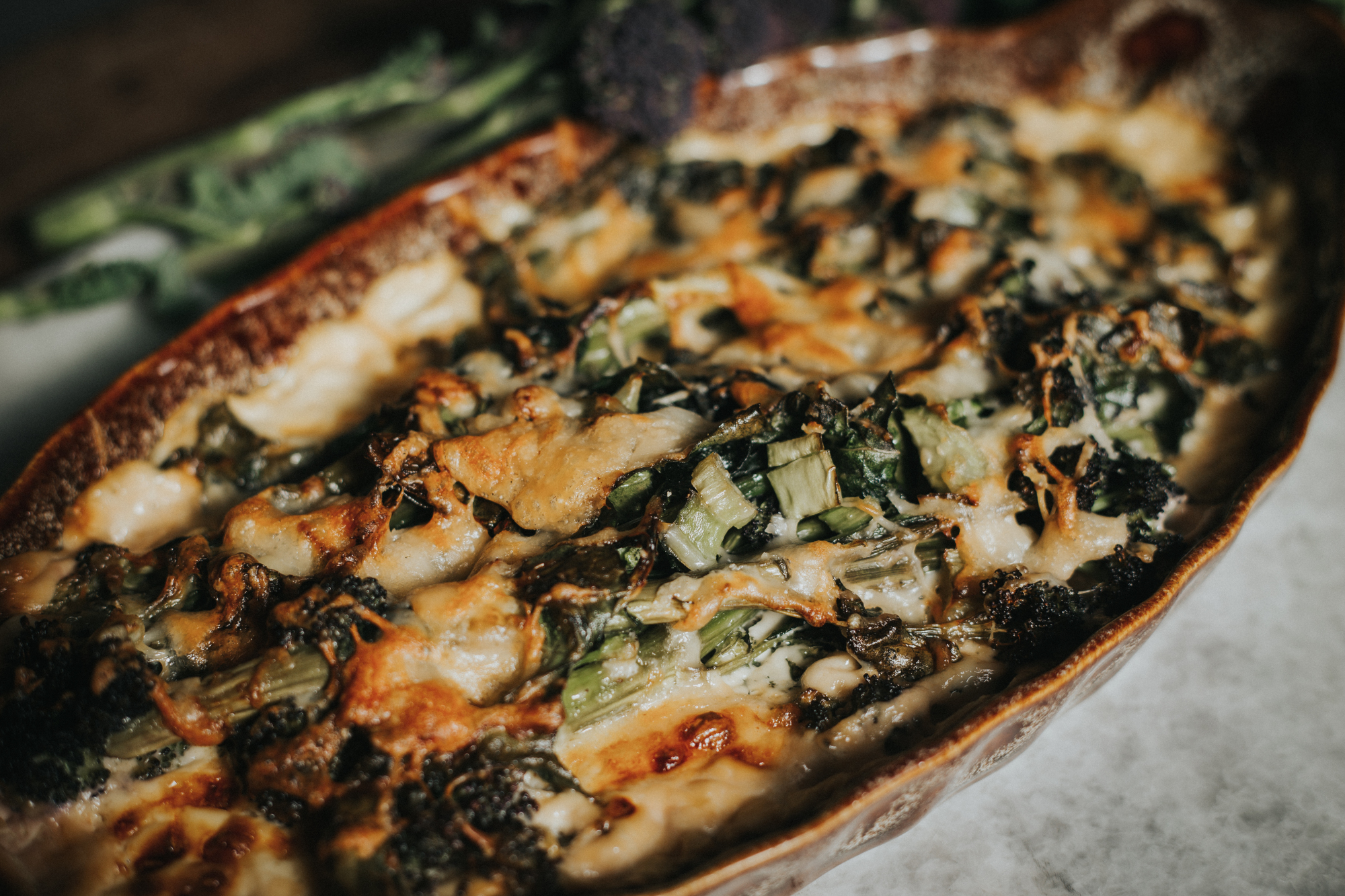Purple Sprouting Broccoli & Spring Greens Gratin