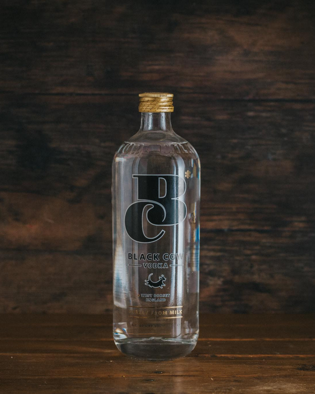 A bottle of Black Cow Vodka.