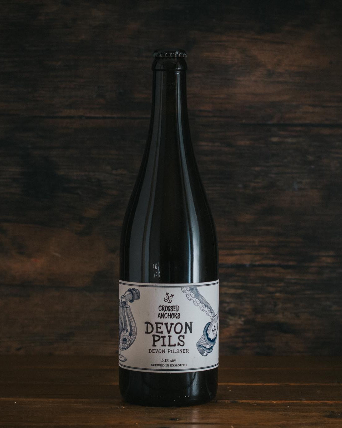 A bottle of Crossed Anchors Devon Pils.