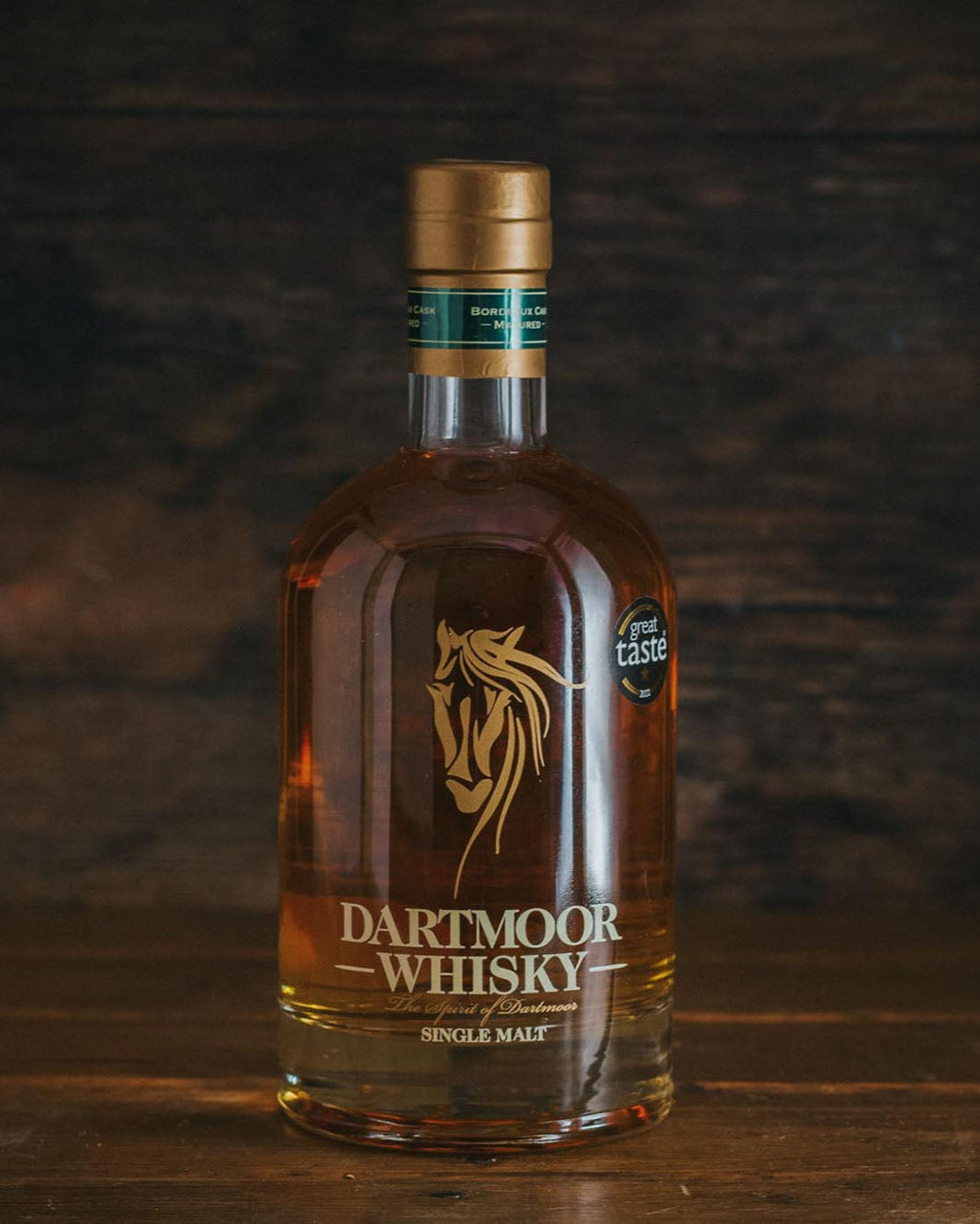 A bottle of Dartmoor Whisky.