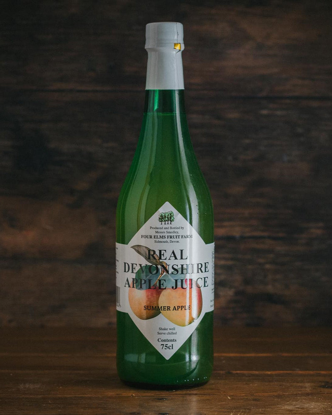 A bottle of Four Elms Devonshire Apple Juice Summer Apple.