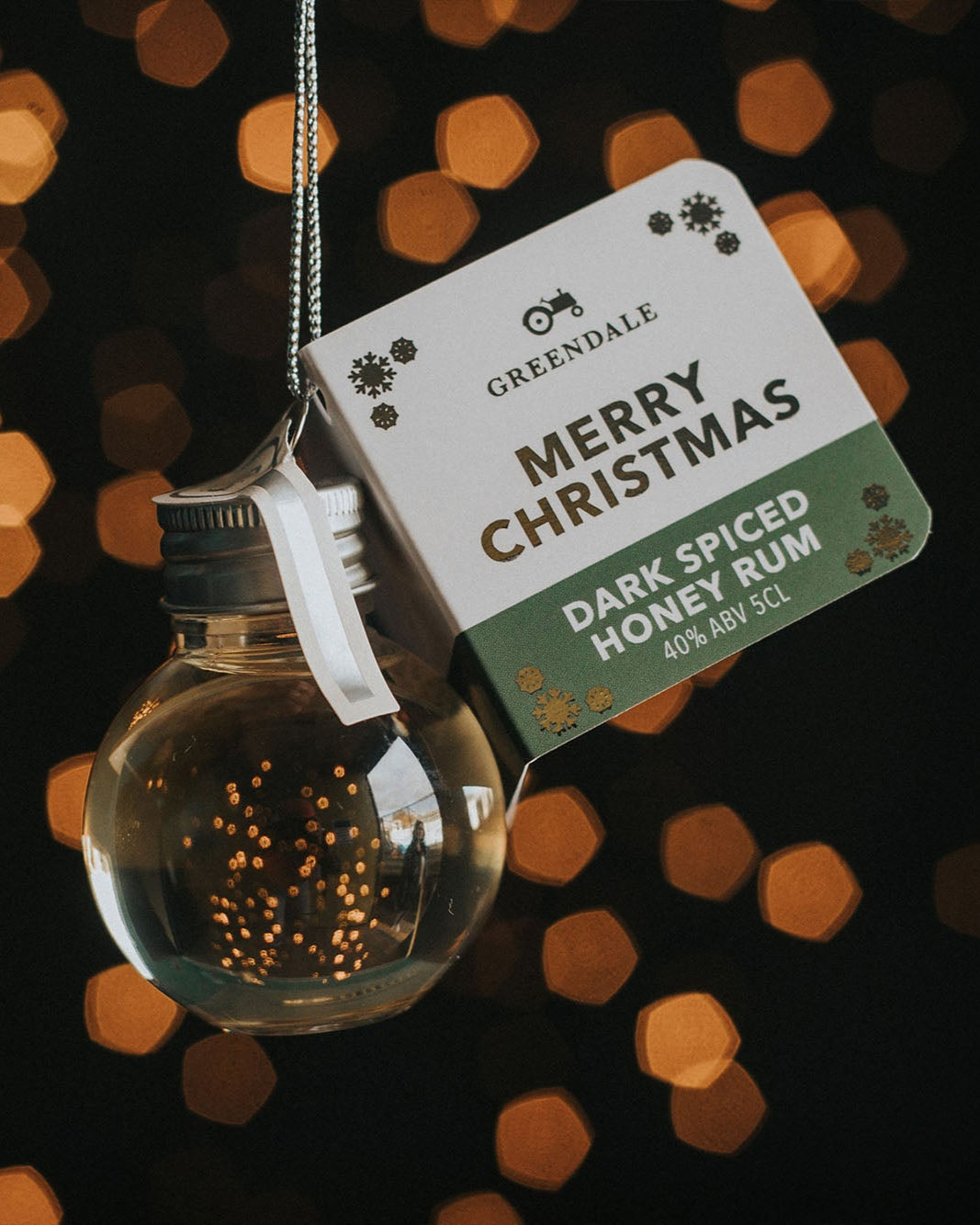 A Christmas Spirit Bauble of Greendale Dark Spiced Honey Rum.