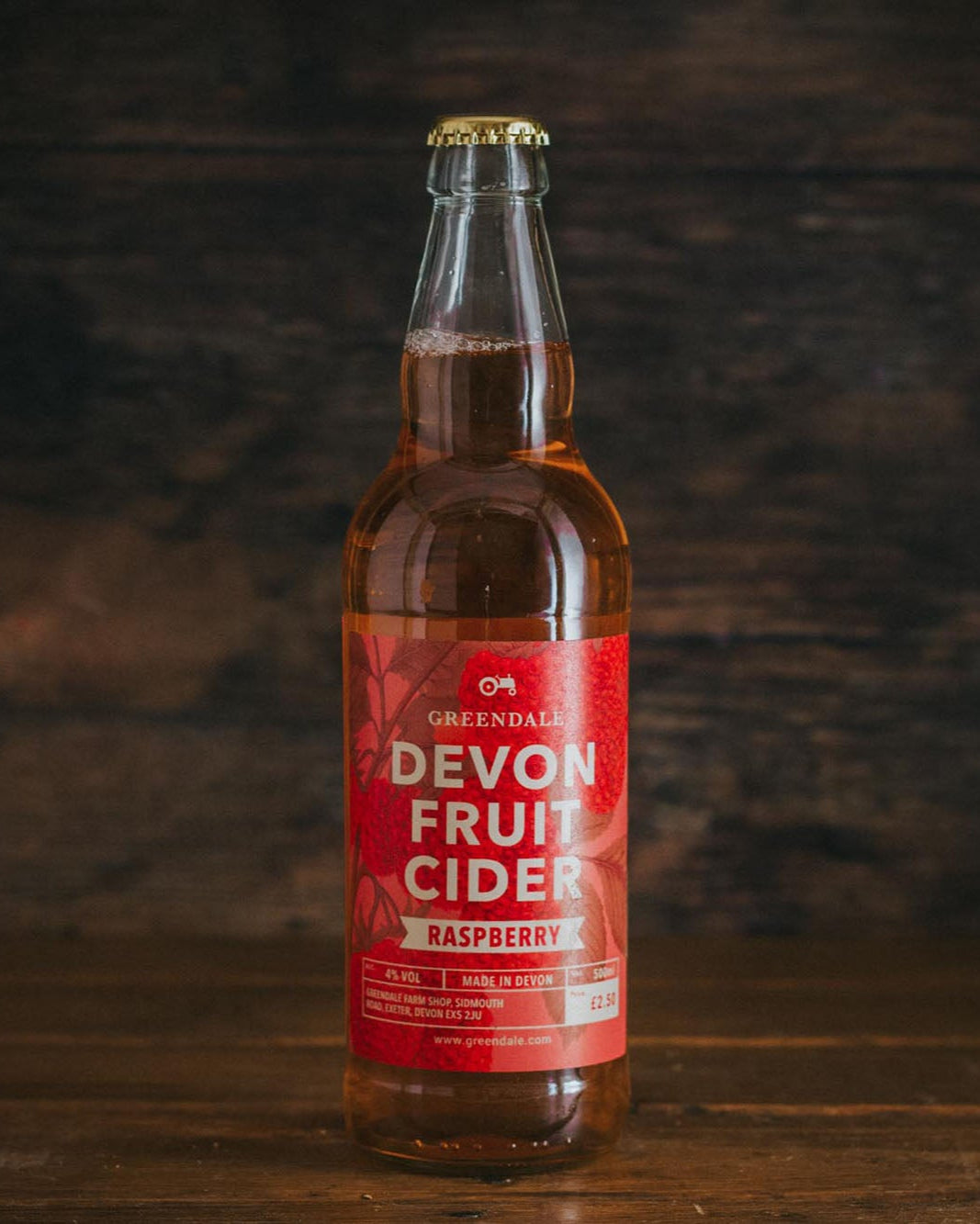 A bottle of Greendale Devon Fruit Cider - Raspberry.