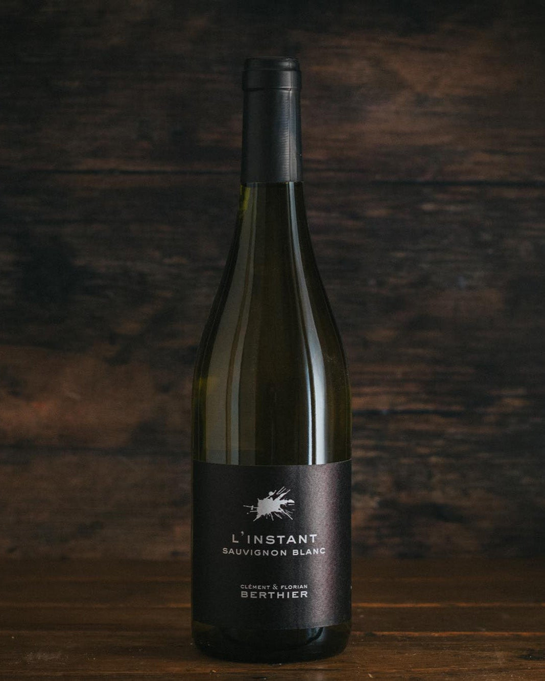 A bottle of L'Instant Sauvignon Blanc.