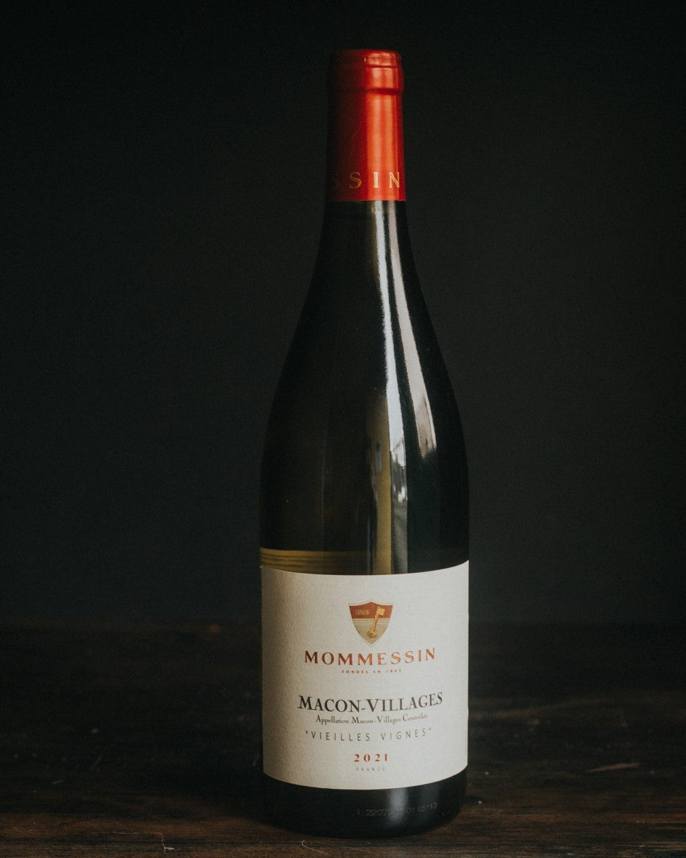 A bottle of Macon Villages Vieilles Vignes Mommessin.