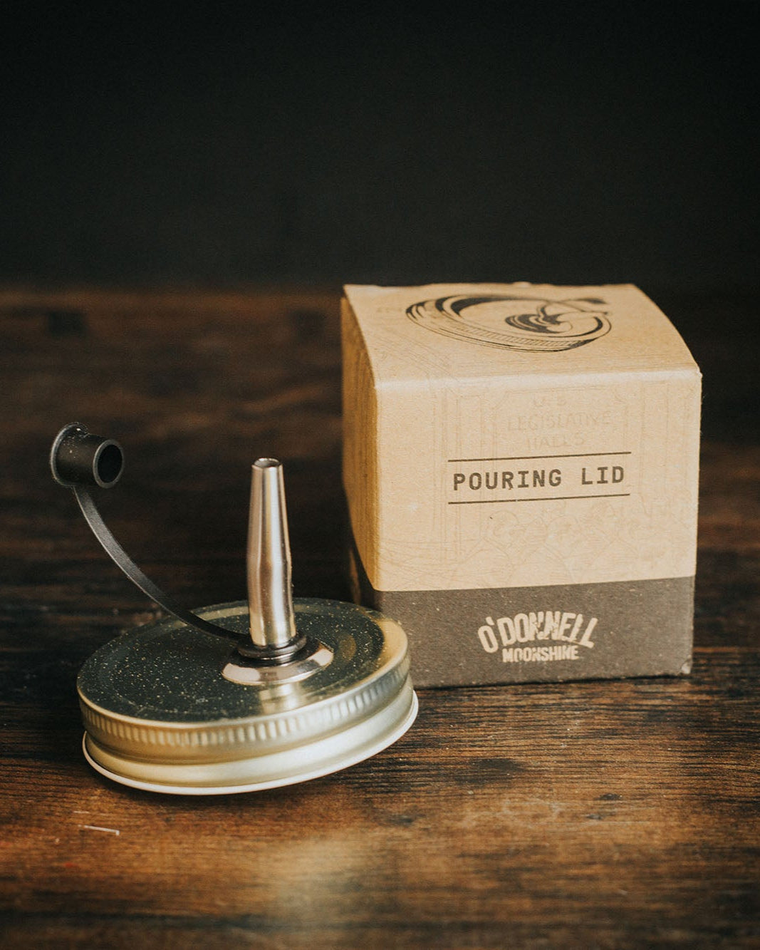 A Moonshine Pouring Lid.
