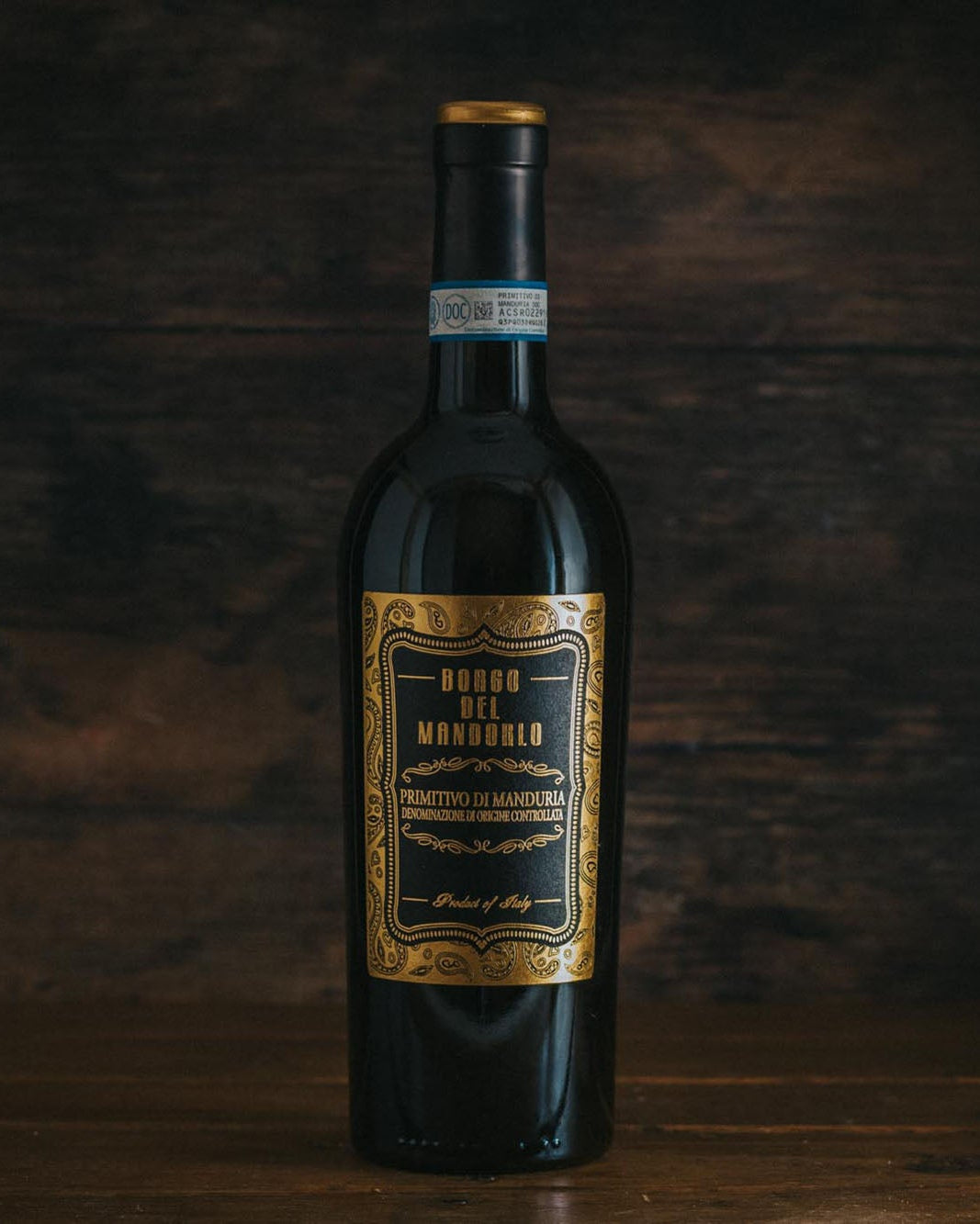 A bottle of Primitivo Di Manduria Borgo Del Mandorlo.