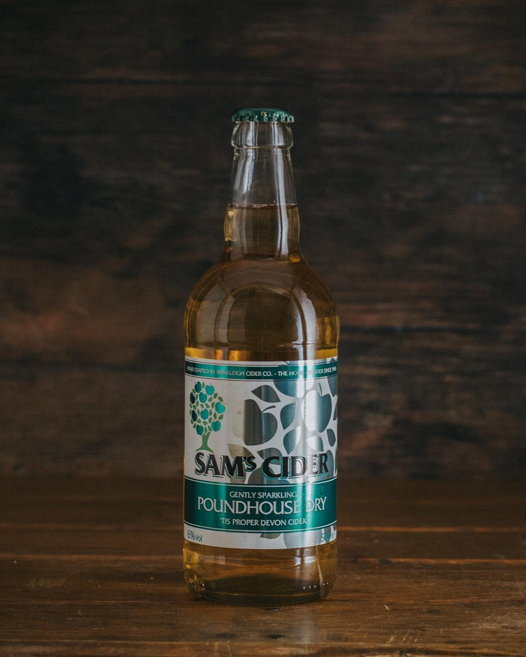 A 500ml bottle of Sam's Poundhouse Dry Cider.