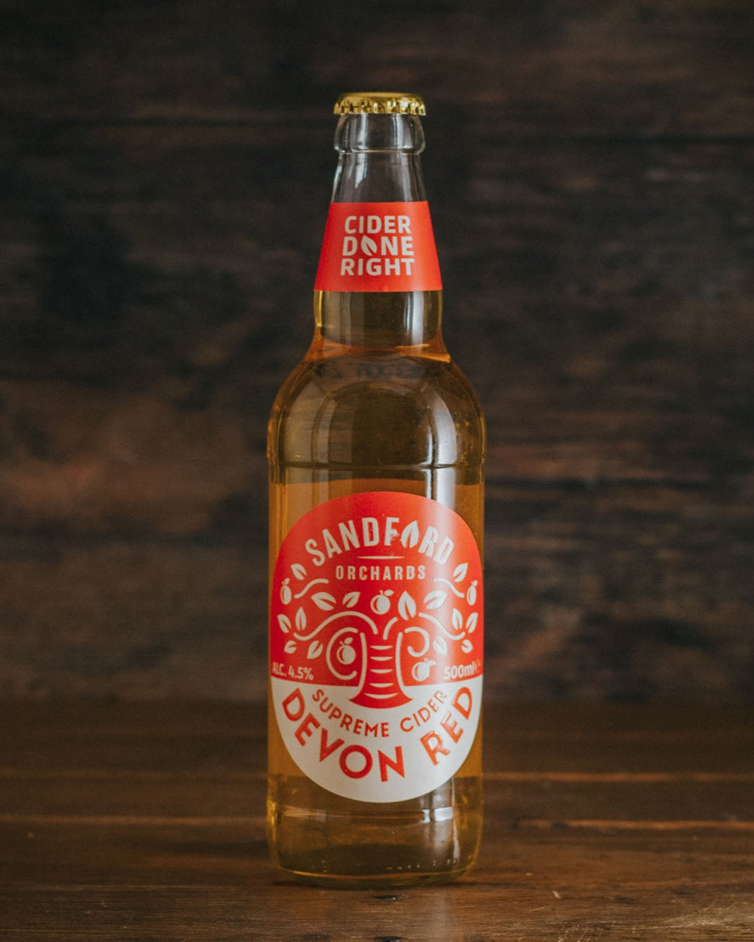 A 500ml bottle of Sandford Orchards Devon Red Crisp & Fruity Medium Cider.